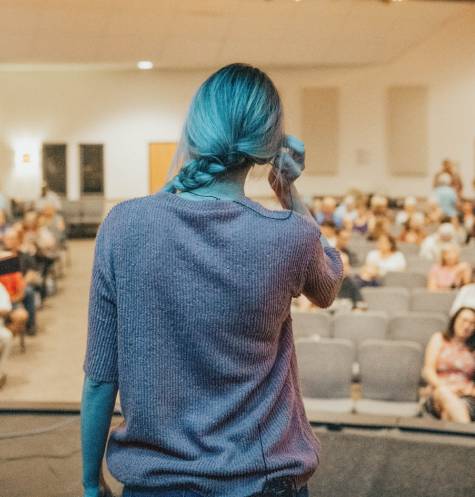 woman giving teaching presentation